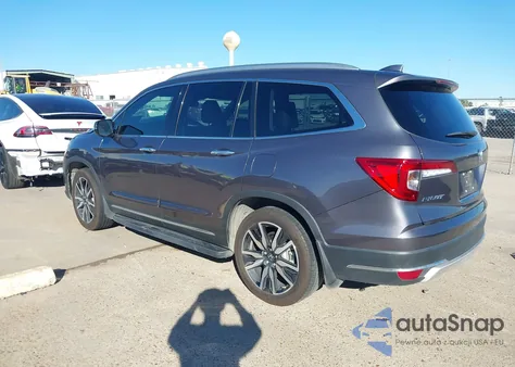 2020 Honda Pilot 2Wd Touring 8 Passenger z USA, uszkodzony, nr VIN 5FNYF5H97LB007227